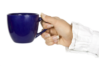 Hand holding cup of coffee