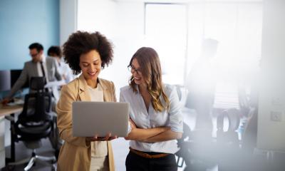 An HR manager is updating timesheets using an HR app