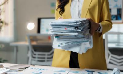 A woman is facing increasing paperwork and admin in her business