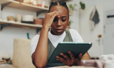 A woman is worried how she will cover her cash flow shortful