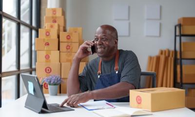 A smiling businessman capitalises on his advantages