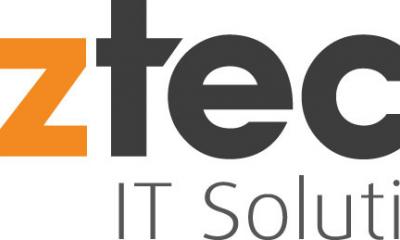 'aztech IT Solutions' sign written in orange and grey