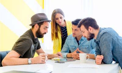Group of people discussing the latest budget news