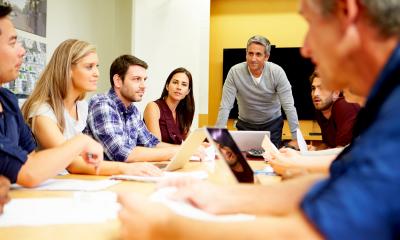 Building your team - checklist group of employees in a meeting