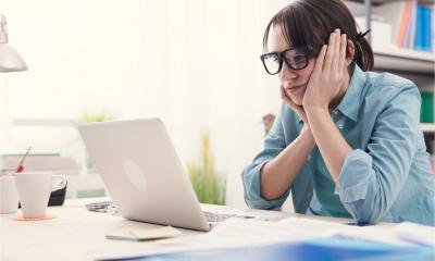 A woman suffers depression in the workplace