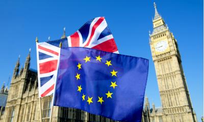 European Union and the United Kingdom flag flying in front of big ben