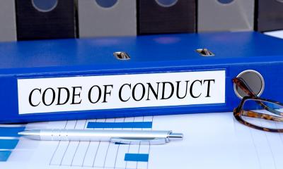 Creating a workplace code of conduct - checklist Code of conduct file on desk
