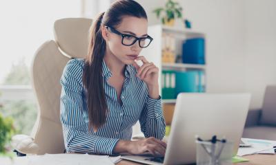 A woman completes work-based training online