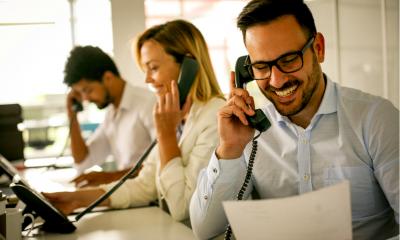 A telemarketing team make cold calls to hot sales prospects
