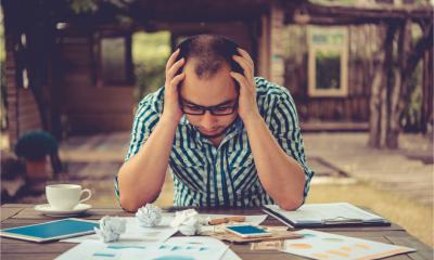A small business owner worries about the future