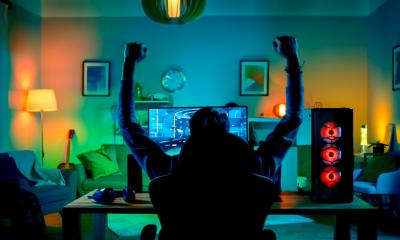 A gamer celebrates winning a game
