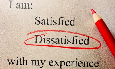 The word 'dissatisfied' circled by a red pencil