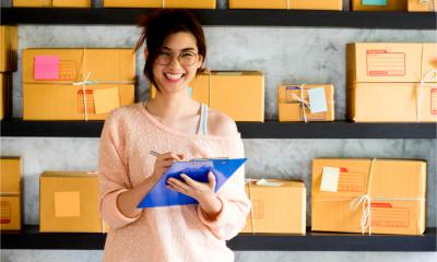 Young entrepreneur works at home for her side hustle