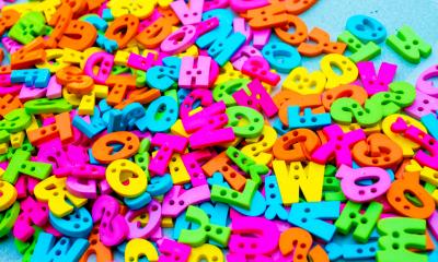 A pile of multi coloured letters to represent an alphabetical business jargon buster