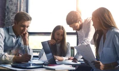 A group of business colleagues brainstorm innovative ways to beat the competition.