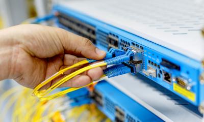 Plugging in the fibre optic cables for a new broadband provider