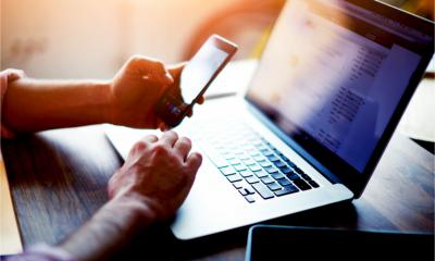 An overseas national manages his UK business bank account online and through a mobile app.