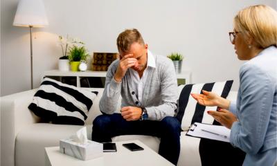 A man visits the company HR department to address his poor mental health