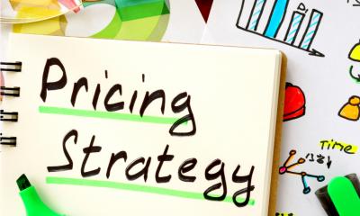 A note pad with the words Pricong strategy written at the top