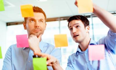 Two marketers working on a marketing strategy
