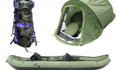 Large backpack, tent, and blow up canoe with white background
