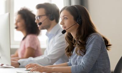 Call centre handlers answer calls from businesses concerned about the impact of coronavirus