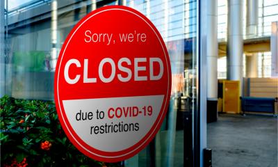 Company closed due to COVID-19 lockdown, temporarily closed sign