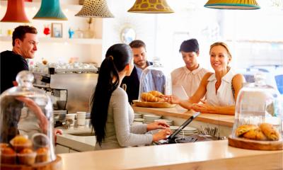 Local customers in café ordering food
