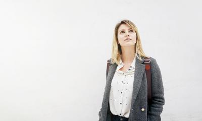 Employee thinking about her professional development
