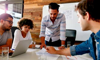 A marketing team review the results of their market research