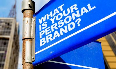 A street sign saying "What is your personal brand?"