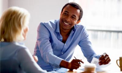 Sales meeting between two business people, selling products and services