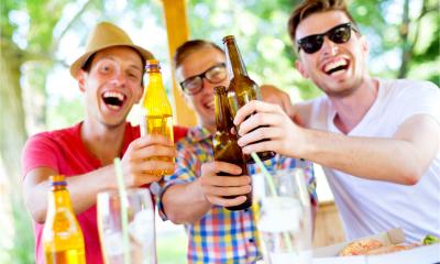 Three flat mates celebrate the pub re-opening after lockdown