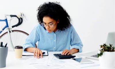 A woman completes her self assessment tax return early