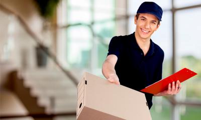 Setting up a delivery service - checklist A smart young man delivers a parcel.