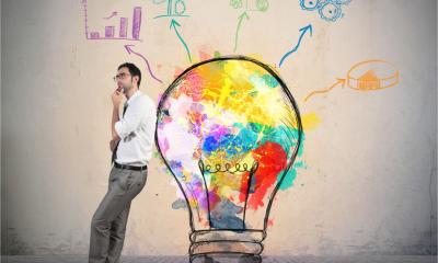 Businessman thinks of a new creative idea