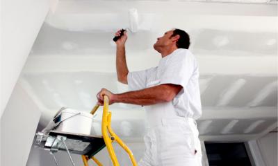 A busy painter and decorator at work