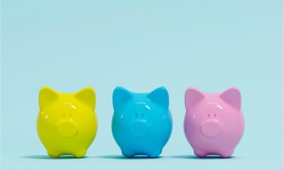 Row of coloured piggy banks to represent different sources of start up funding