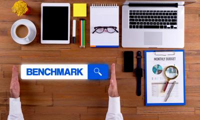 A man prepares the tools he needs to carry out a benchmarking exercise