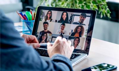 A man joins a video call while working form home