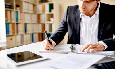 Entrepreneur writting a business plan